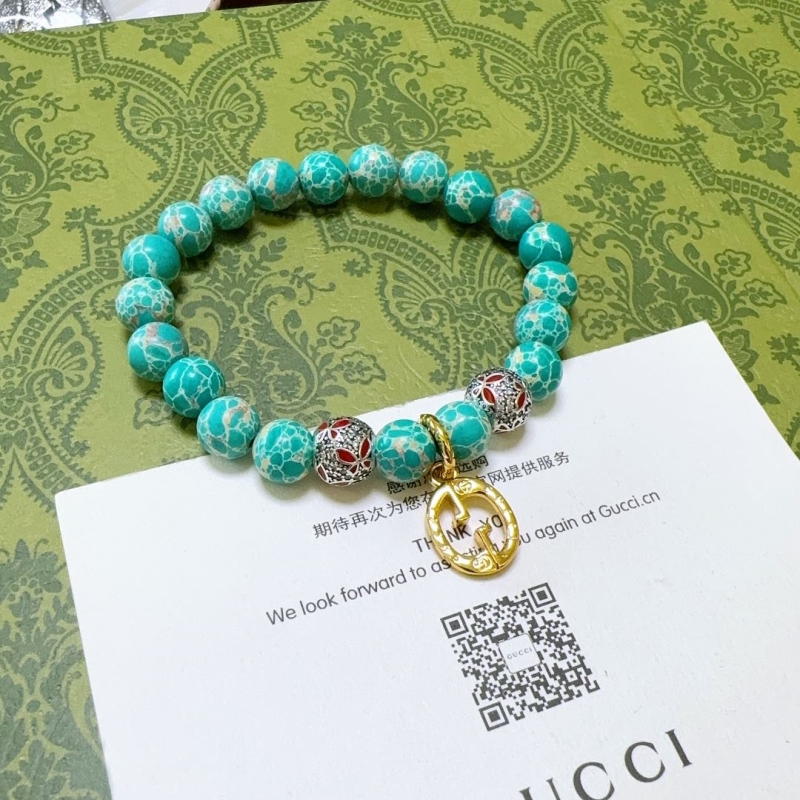 G*u*i bracelets